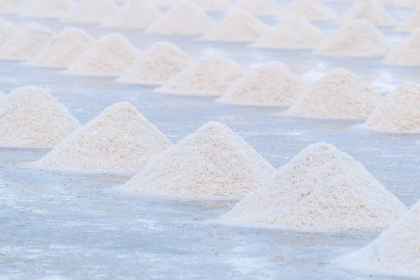 Salt piles in seaside farm
