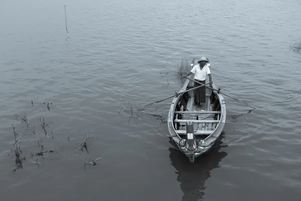 Unidentified man in boat