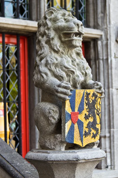 Lion statue with coat of arms