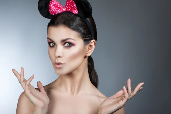 Style woman portrait perfect face, professional make. fashion mouse with big ears. Fashion art photo.