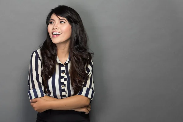 Happy young woman in work suit