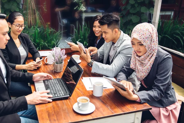 Creative business meeting in a cafe