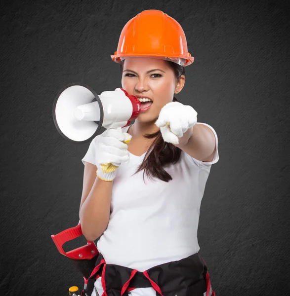 Female construction worker shouting