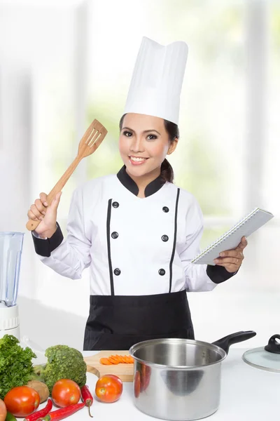 Pretty Chef woman cooking
