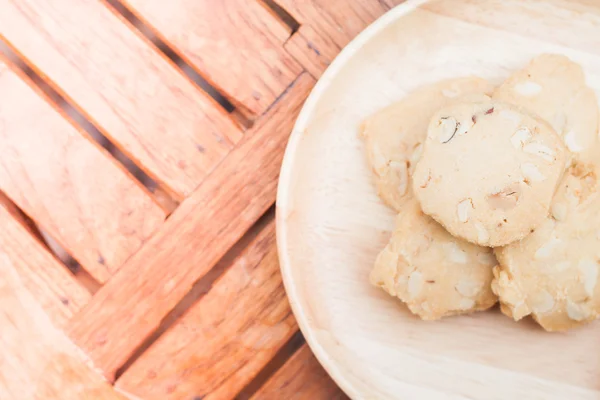 Cashew cookies on wooden plate