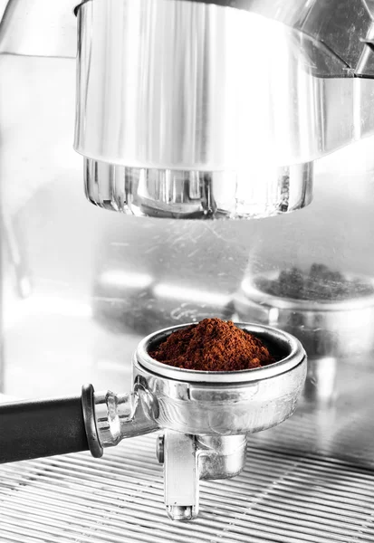 Coffee grind in group with black and white filter