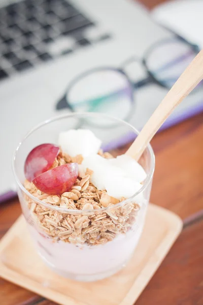 Granola with fruits on work station