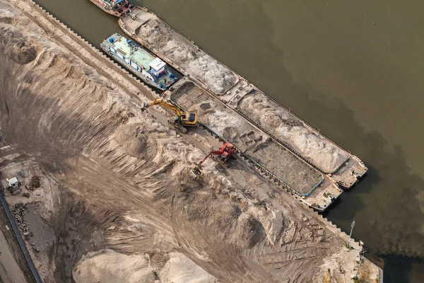 Aerial view of long arm excavator working