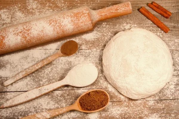 Homemade baking. Fresh dough for pastry, kitchen rolling pin, spoon flour on a chopping Board