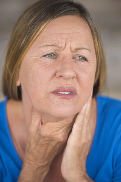 Woman in pain with throat ache from cold