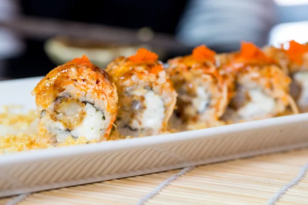 Sushi salmon roll in Japanese restaurant