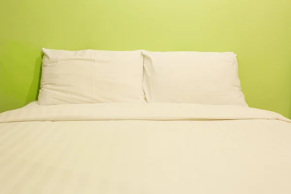 White bed sheets and pillows