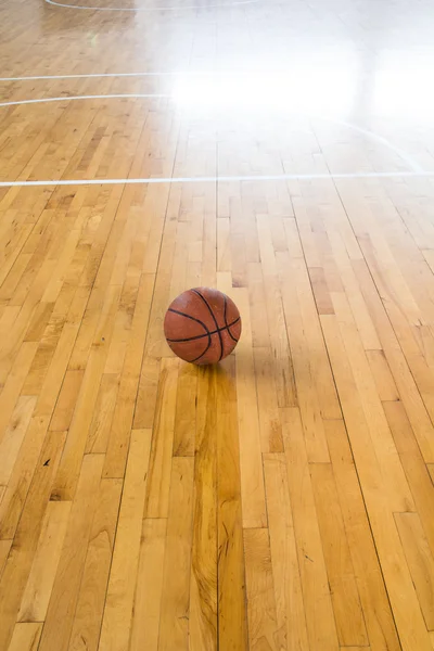 Basketball ball over floor