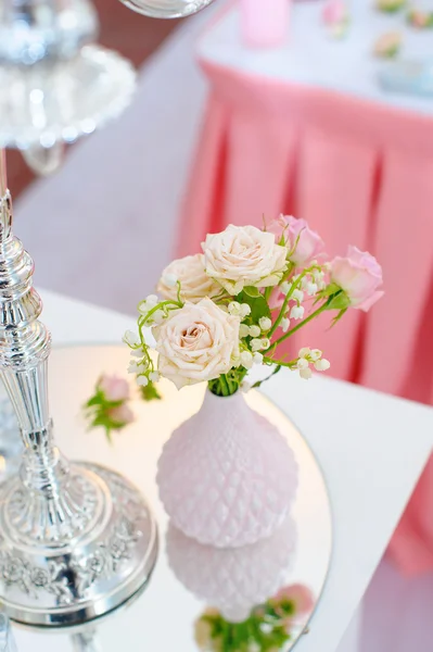 Decor of flowers on wedding table in a restaurant
