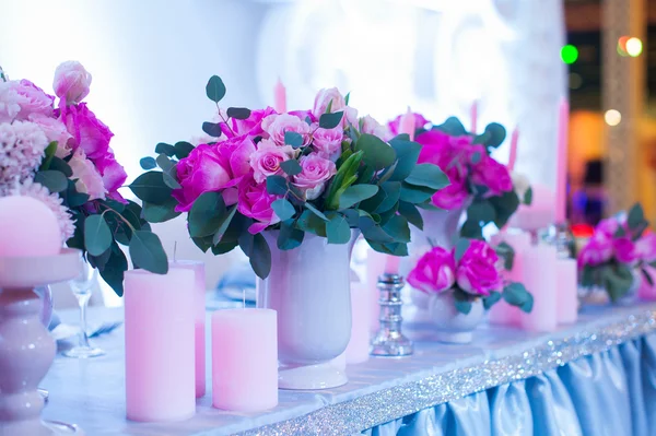 Decor of flowers on wedding table in a restaurant