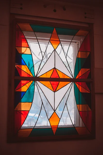 Stained glass window of colored glass