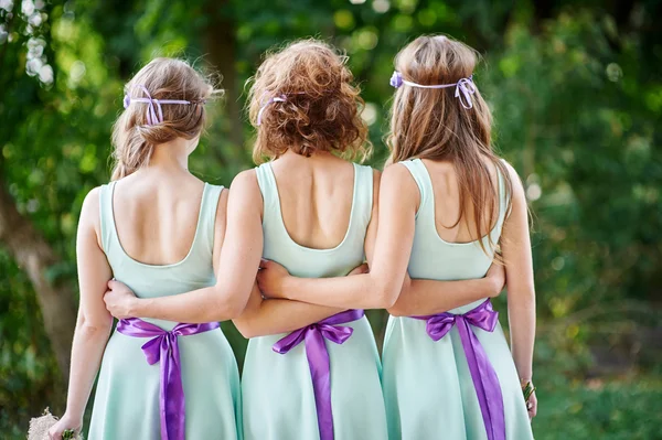 Three bridesmaids are back in the park