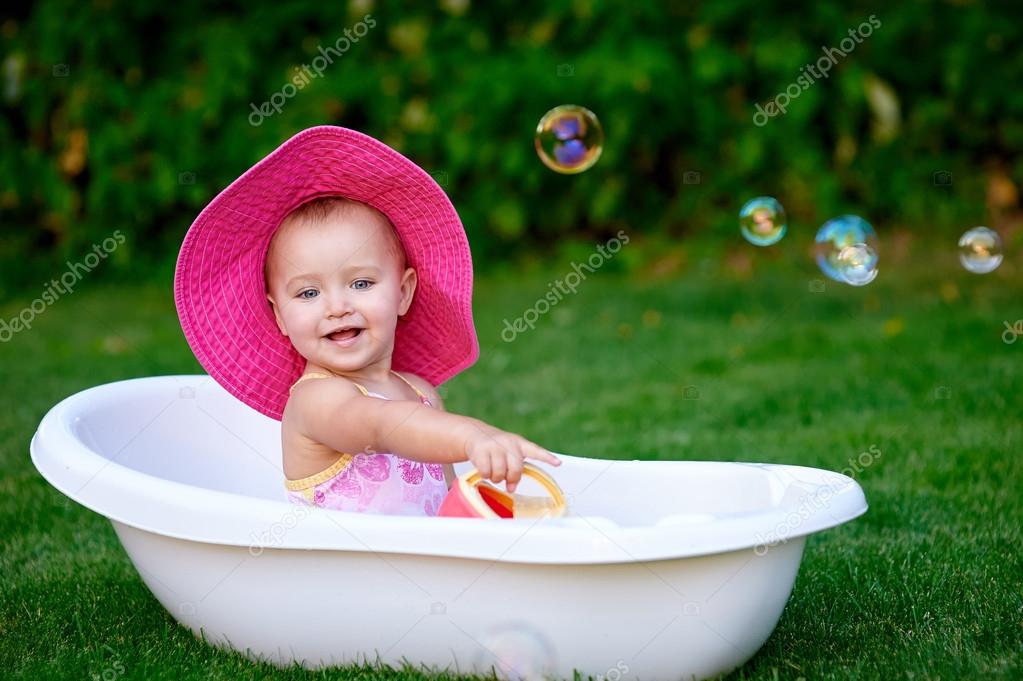 Baby Girl 1 2 Year Old Taking Bath With Soap Foam Outdoors Stock Baby Girl 1 2 Year Old Taking Bath With Soap Foam Outdoors Stock Image