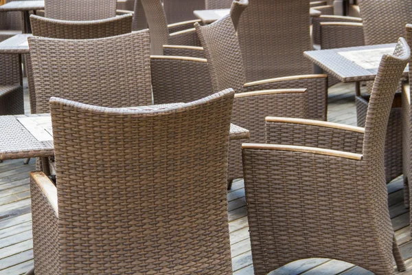 Chairs and tables in the outdoor restaurant in summer