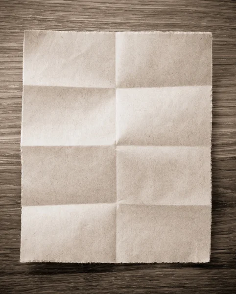 Note paper on wooden  background