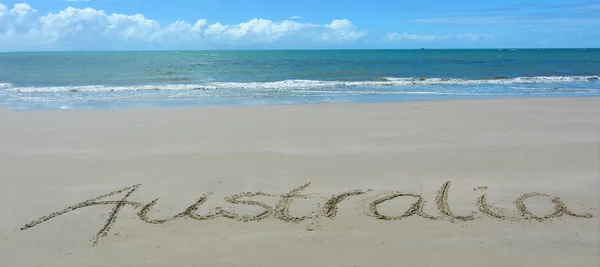 The word Australia written in sand