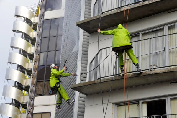 Window cleaners works on high rise building