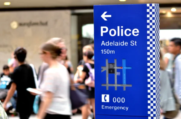 Australian people pass by Police Station
