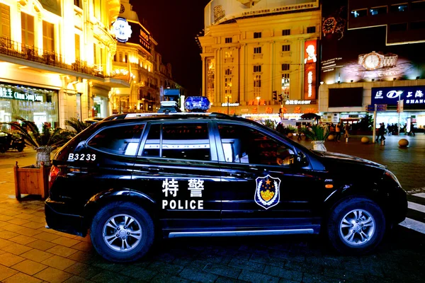 Chinese police car guarding Nanjing Road