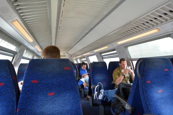 Passengers travel on Israel Railways train