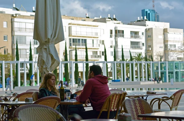 Couple dining in cafe in Habima Square in Tel Aviv, Israel