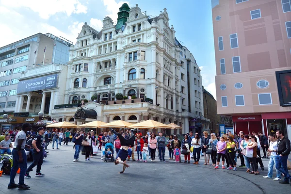 Street dancing show in Leicester Square London UK