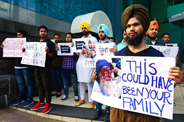 Sikh men protest during Diwali festival in Auckland, New Zealand