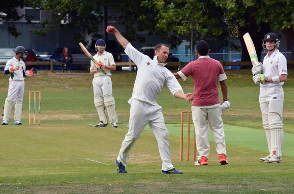 Cricket bowler warms up before game