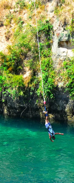 Person during bungy jump in Taupo New Zealand