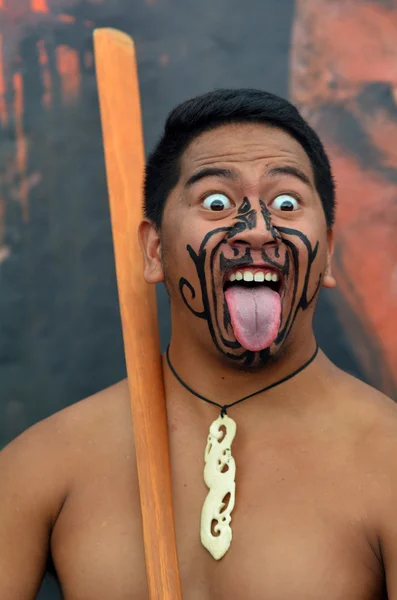 Maori man in traditional greeting