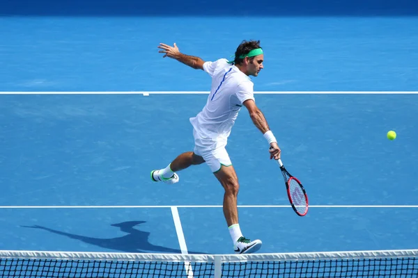 Seventeen times Grand Slam champion Roger Federer of Switzerland in action during quarterfinal match at Australian Open 2016