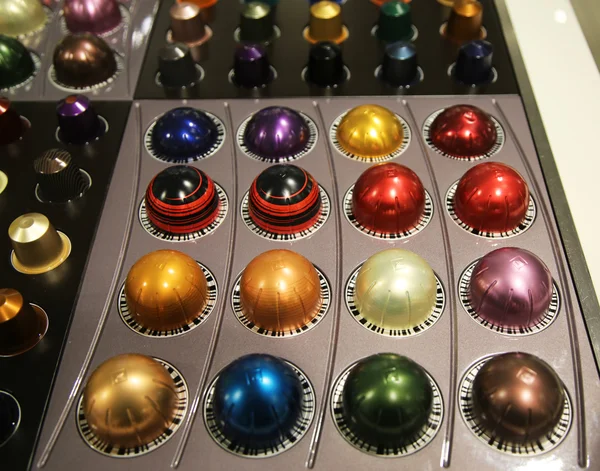 Variety of coffee capsules in Nespresso store in New York.