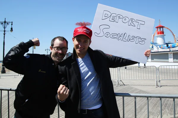 Donald Trump supporters protest against presidential candidate Bernie Sanders during his rally at iconic Coney Island boardwalk in Brooklyn