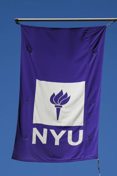 NYU flag on historic Puck Building at Wagner Graduate School of Public Service in Lower Manhattan