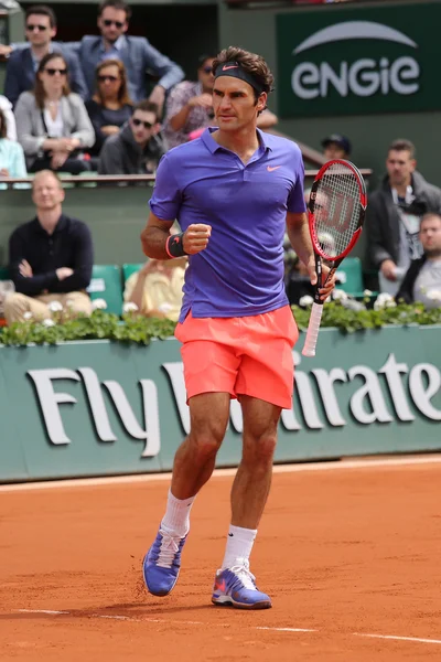 Seventeen times Grand Slam champion Roger Federer in action during his third round match at Roland Garros 2015