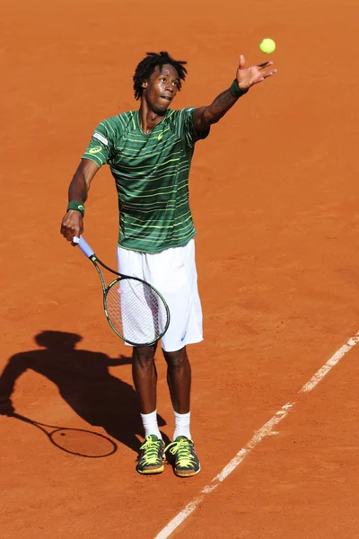 Professional tennis player Gael Monfis of France in action during his second round match at Roland Garros 2015