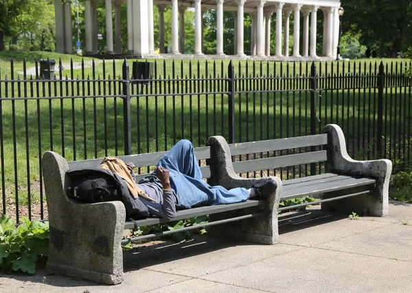 Homeless man at Prospect Park in Brooklyn, New York