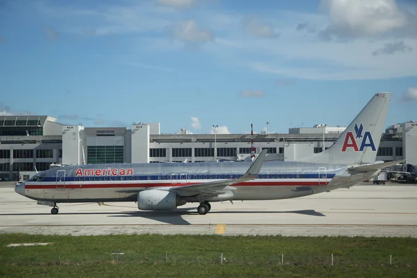 American Airlines Boeing 737 plane on tarmac at Miami International Airport.