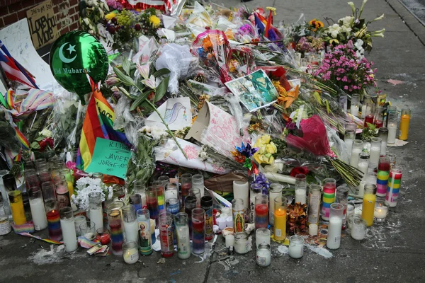 Memorial outside the gay rights landmark Stonewall Inn for the victims of the mass shooting in Pulse Club, Orlando