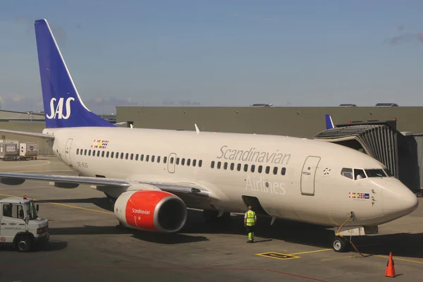 Scandinavian Airlines jet at the gate at Keflavik International Airport