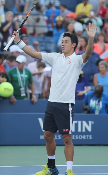 Professional tennis player Kei Nishikori of Japan celebrates victory after his round four match at US Open 2016
