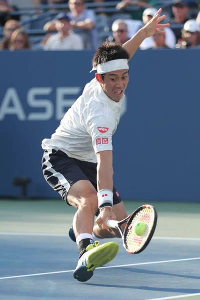 Professional tennis player Kei Nishikori of Japan in action during his round four match at US Open 2016