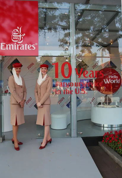 Emirates Airlines flight attendants at the Emirates Airlines booth at the Billie Jean King National Tennis Center during US Open 2014