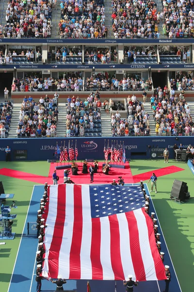 US Marine Corps unfurling American Flag  during the opening ceremony of the US Open 2014 women final