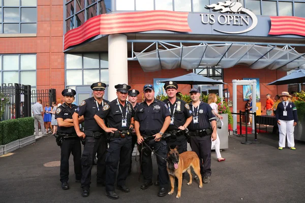NYPD transit bureau K-9 police officers and K-9 dog providing security at National Tennis Center during US Open 2014